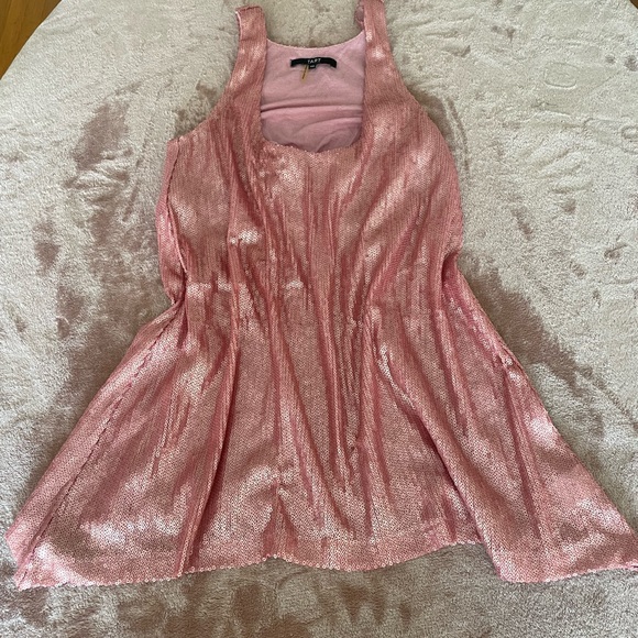 Shiny babydoll shirt. Stunning with a pair of heels and jeans. - Picture 7 of 15